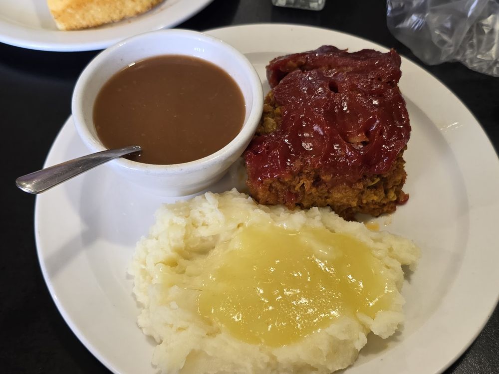 Meatloaf with tomato glaze, mashed potatoes and brown gravy